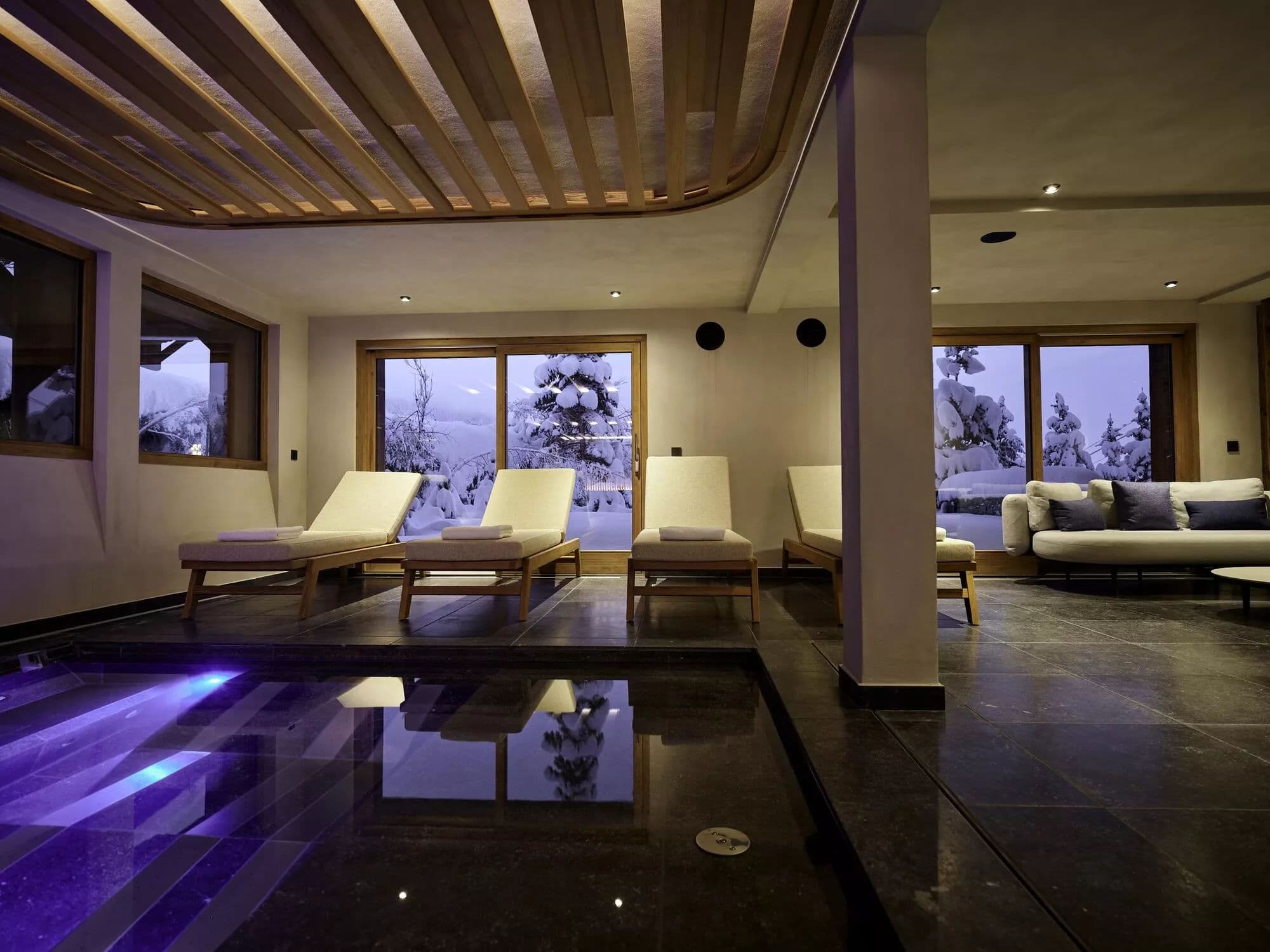 Indoor swimming pool beside a quiet relaxation area