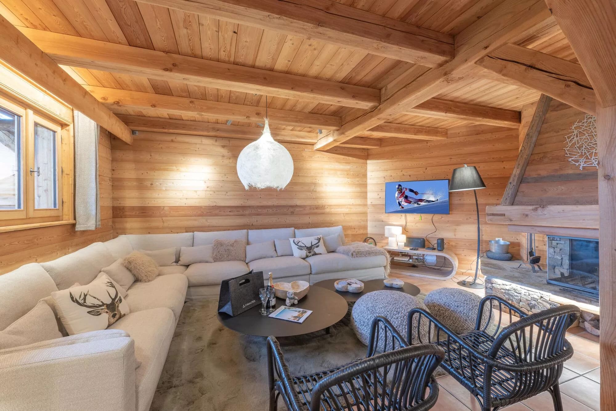 Lounge seating arranged around the wood fireplace