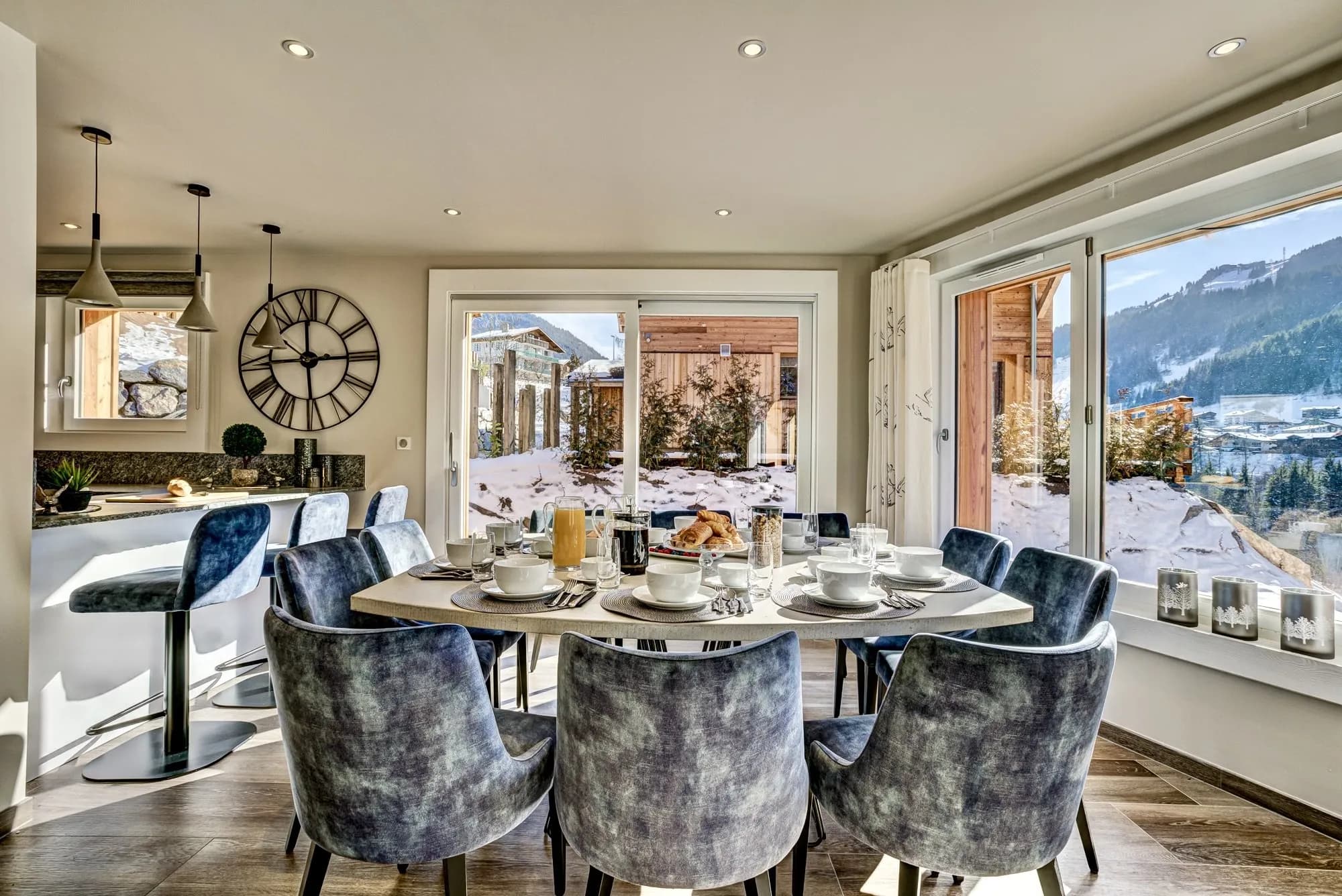 Dining table beside the lounge and panoramic windows