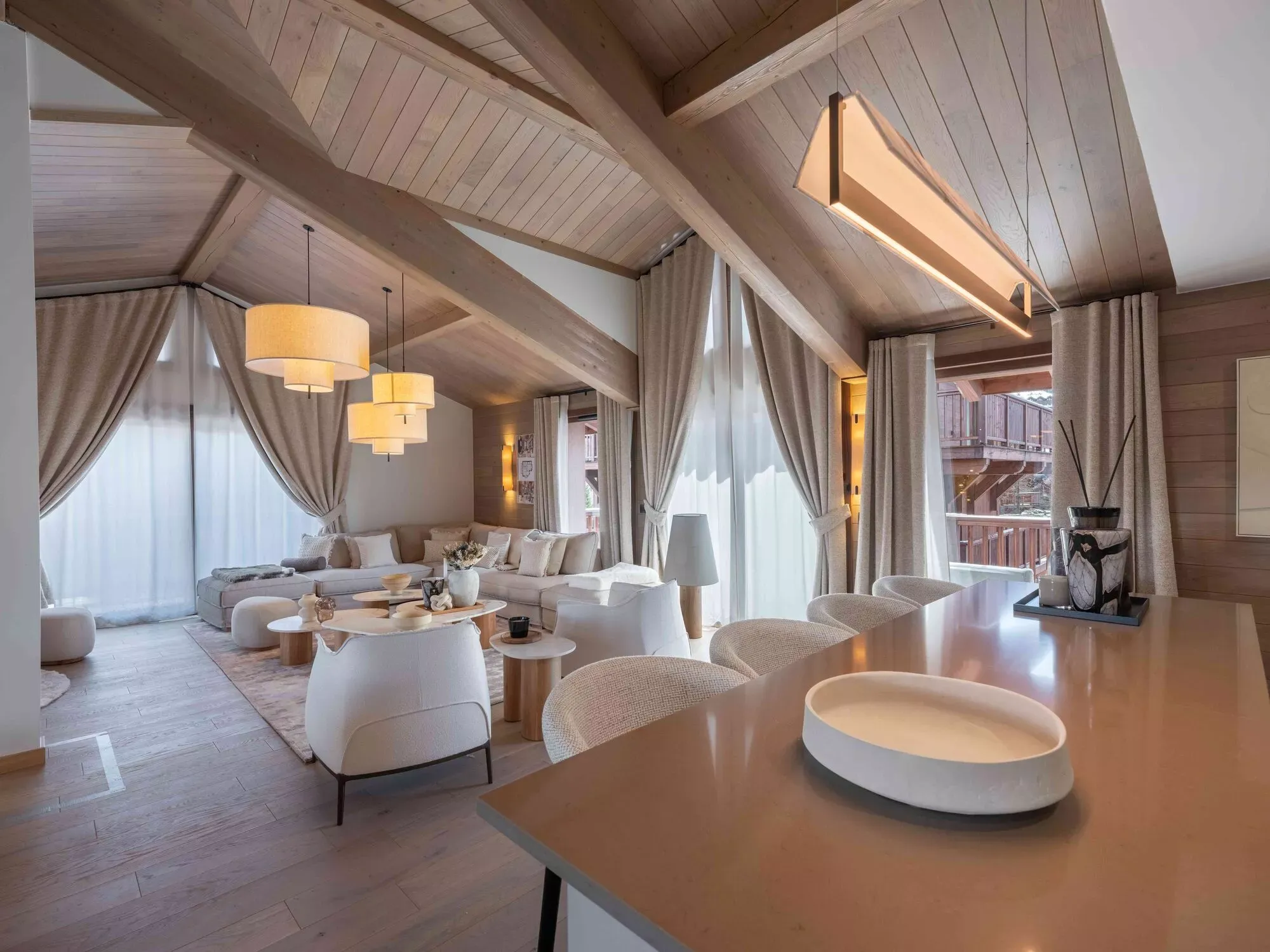 Dining and lounge area opening onto a terrace