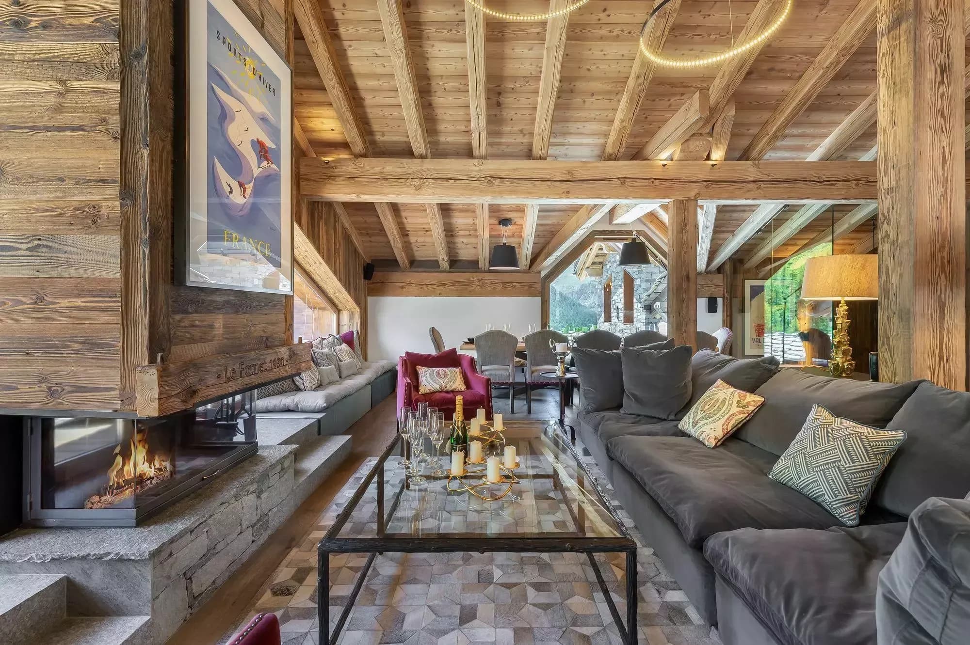 Living room and dining area with the open kitchen beyond