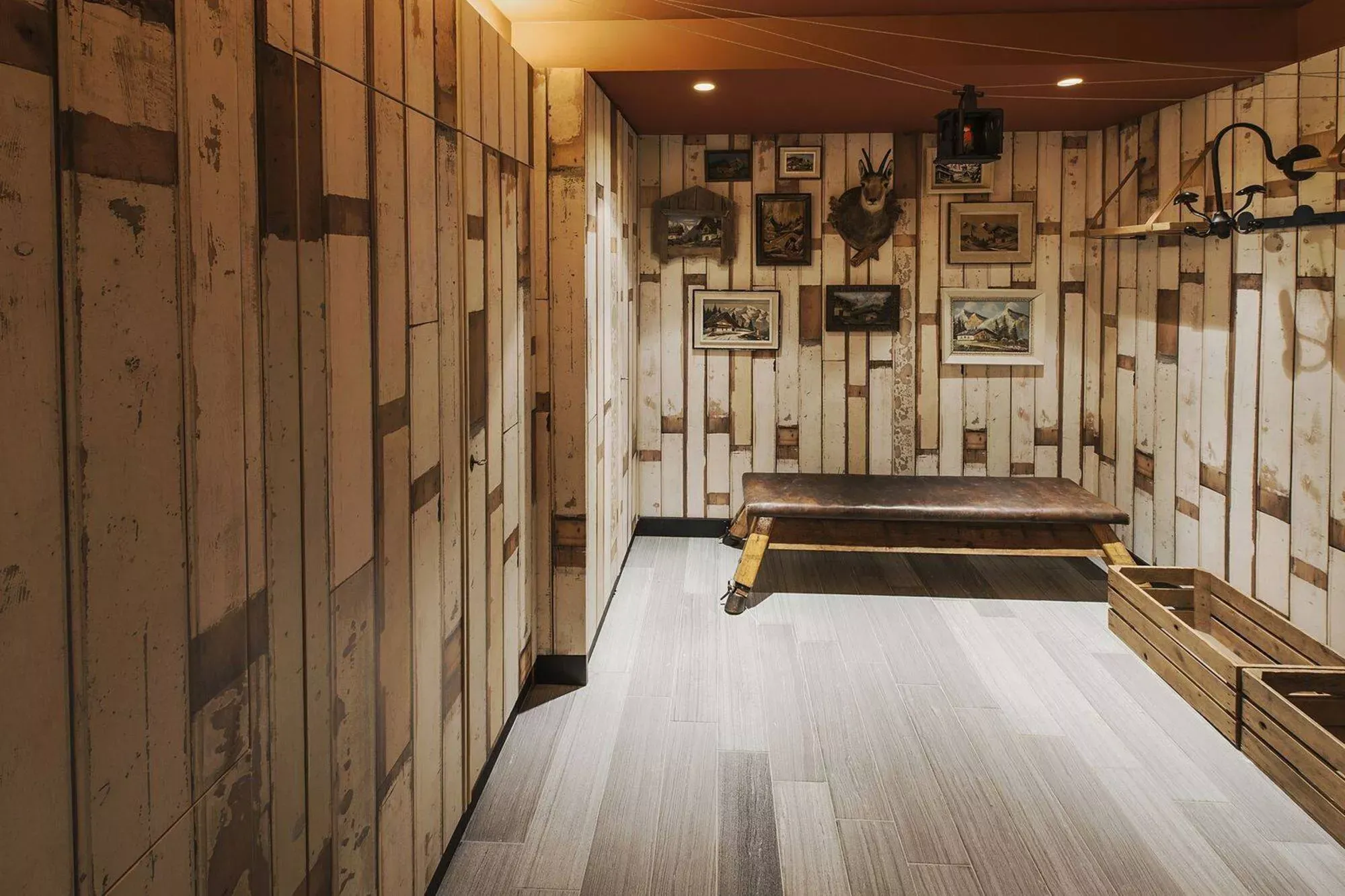 Wood-panelled cinema room with a projector screen