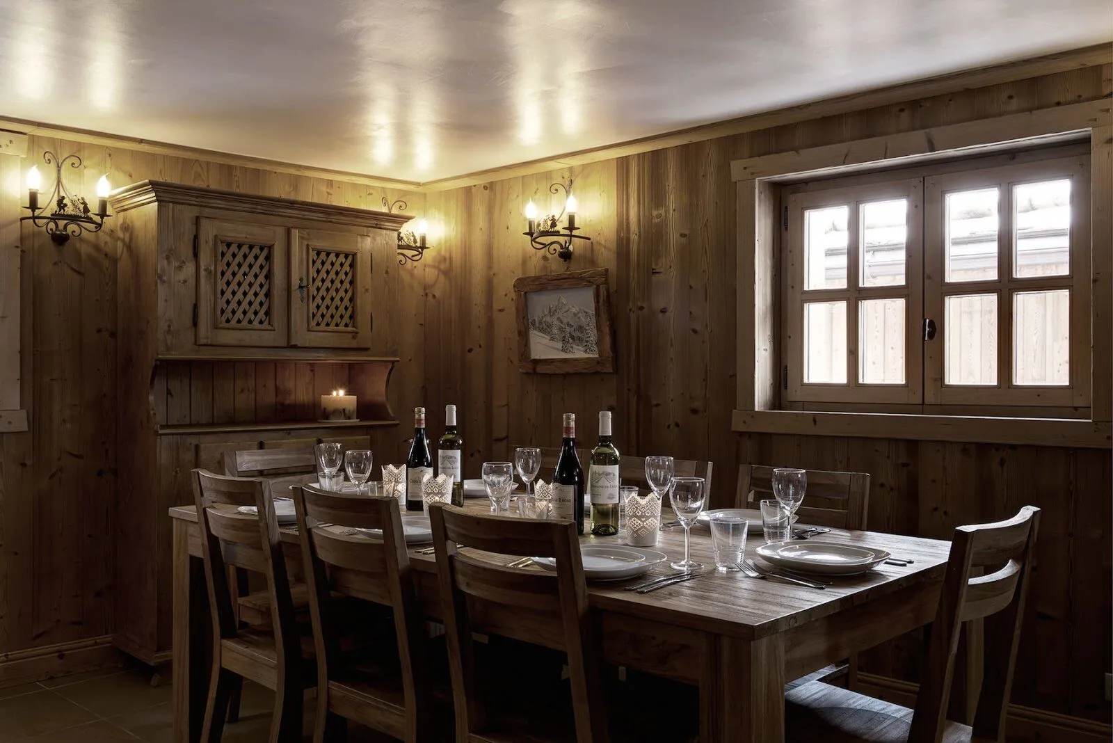Separate wood-panelled dining room