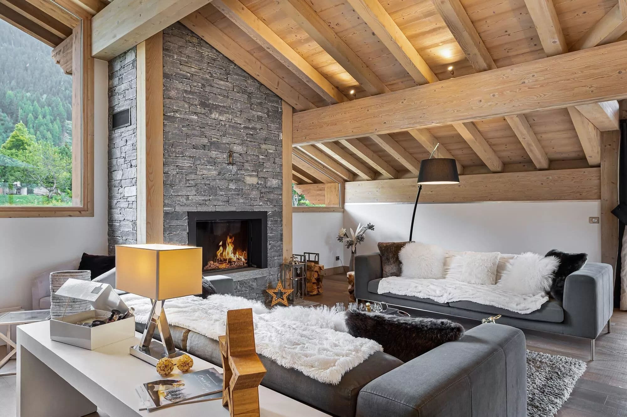Fireplace lounge with timber seating area and reading corner