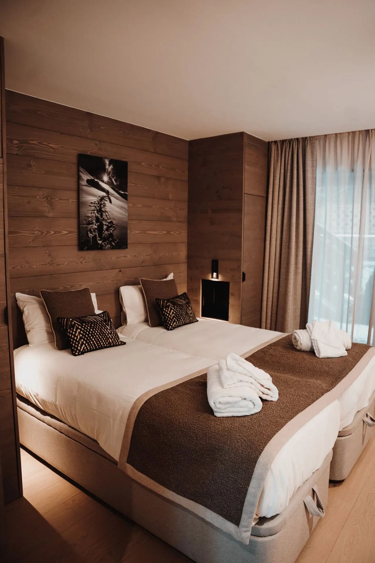 Double bedroom with timber walls