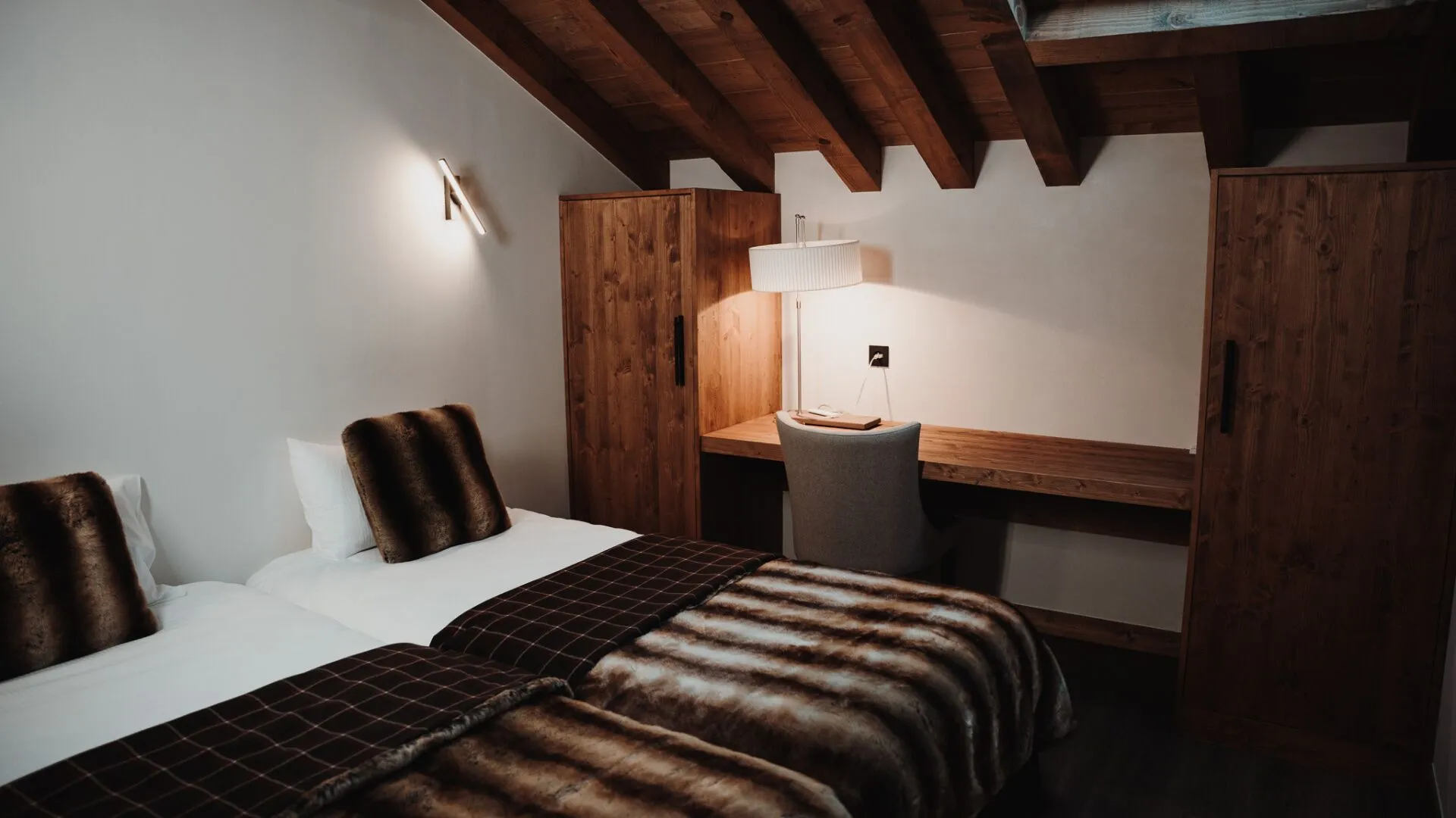 Bedroom with wooden desk and wardrobe