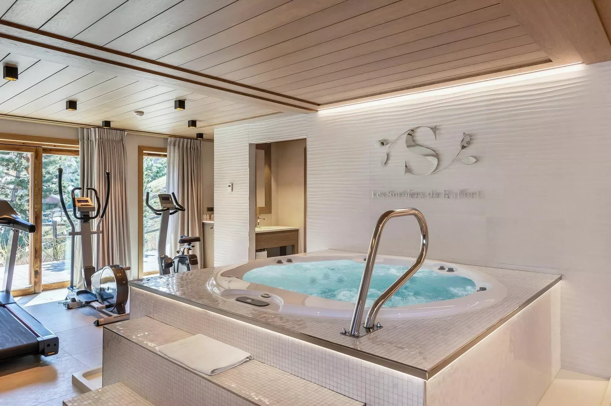 Indoor Jacuzzi beside the fitness area