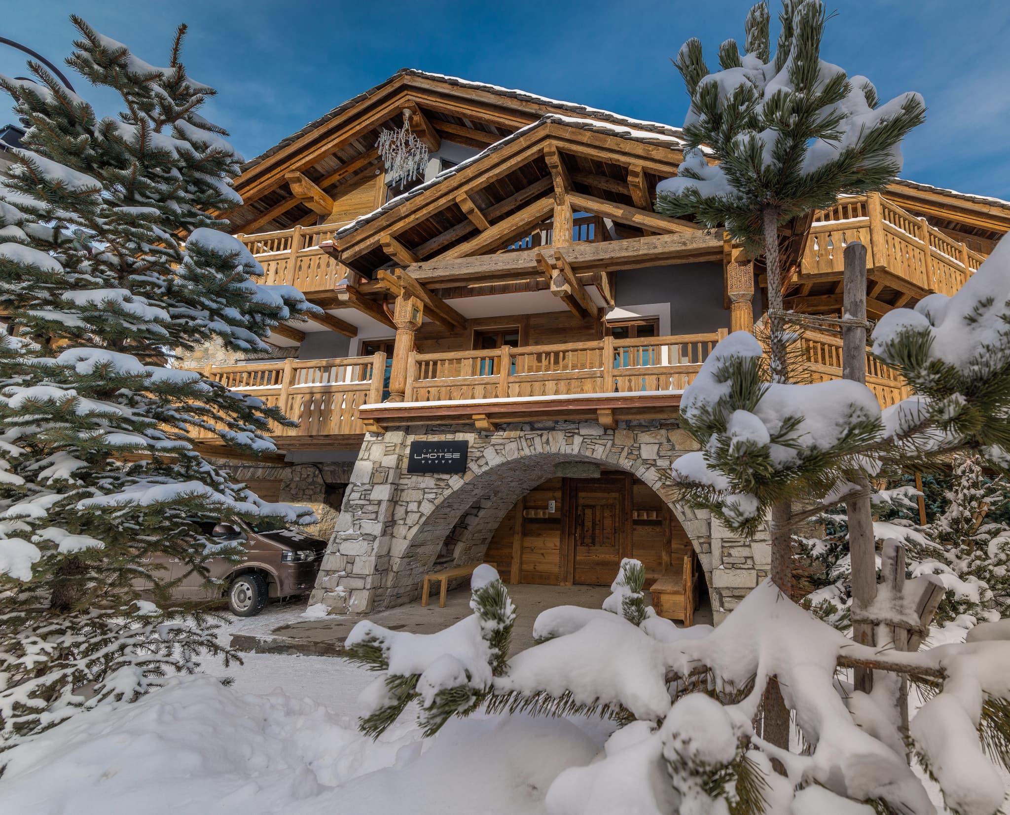 Snow-covered chalet exterior in daylight