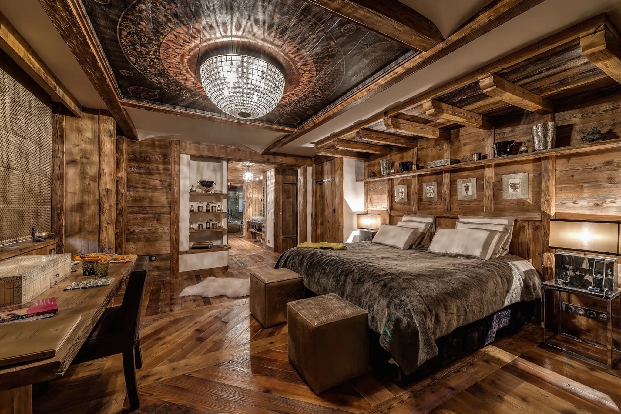 Primary bedroom with timber panelling and an adjoining bathroom
