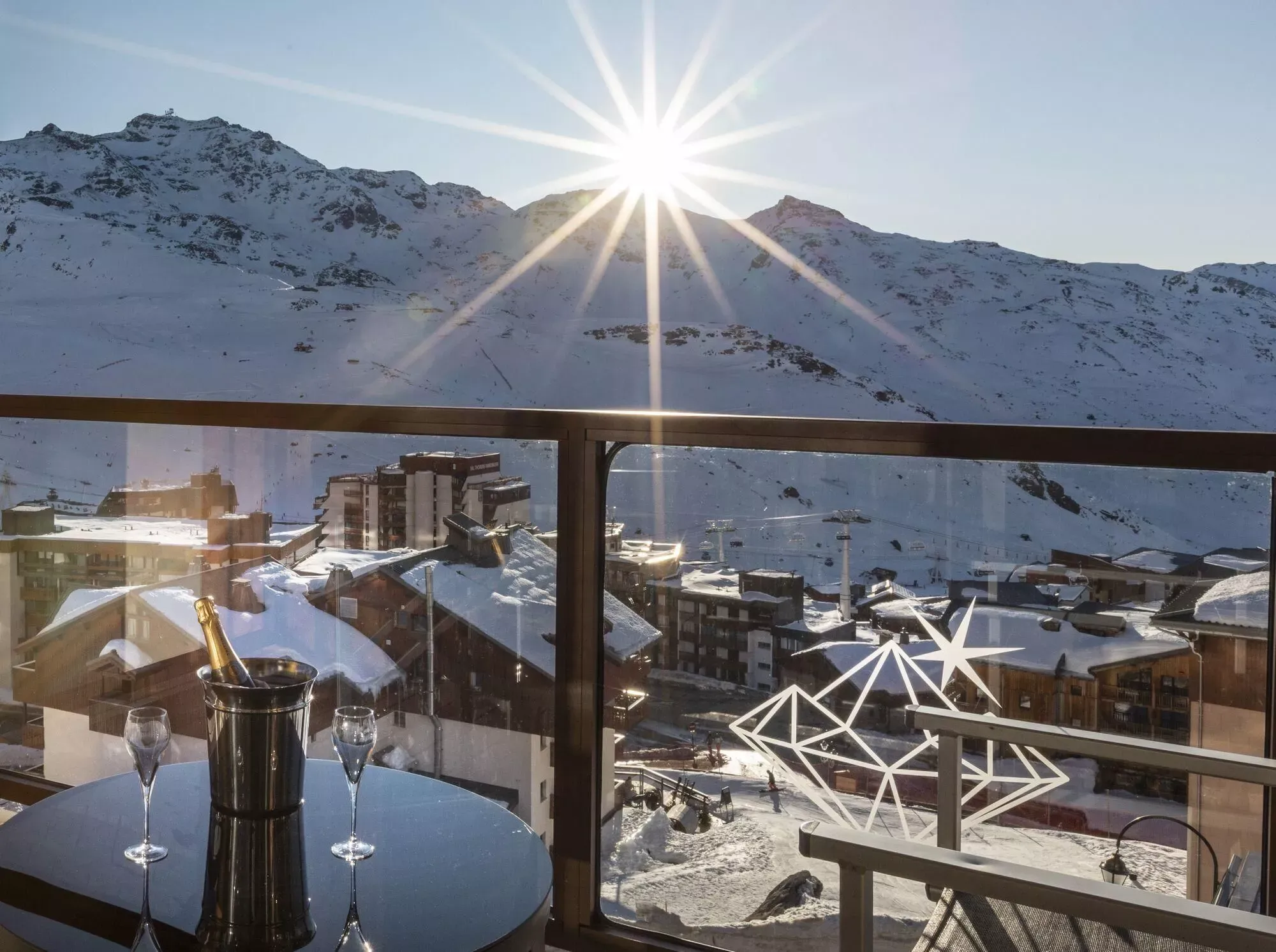 Balcony with outdoor seating and panoramic mountain views