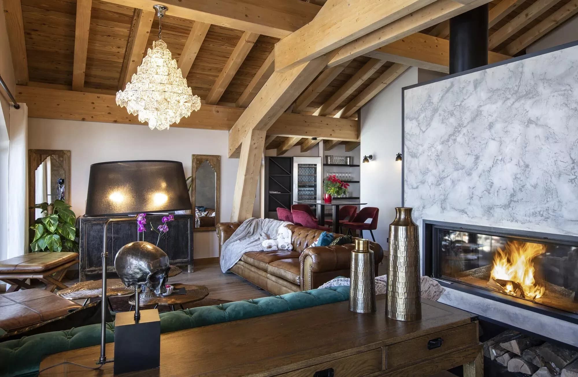 Open-plan living area with fireplace, television and lounge seating