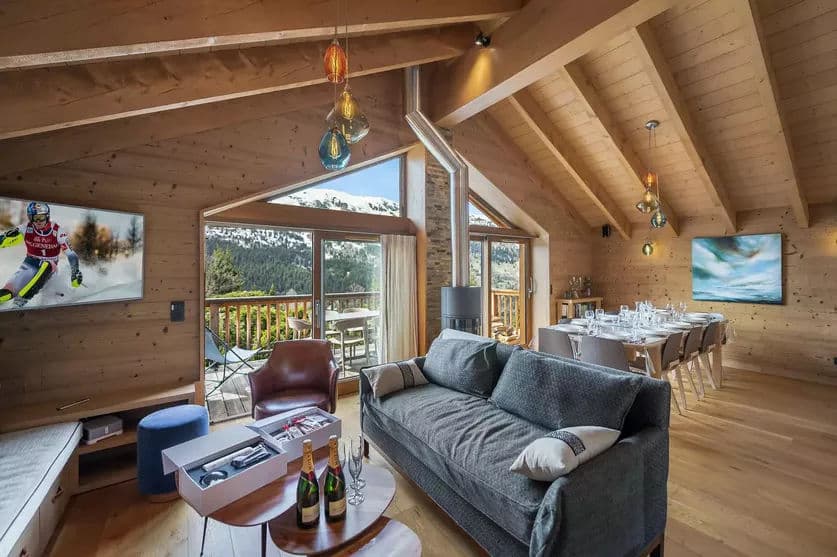 Living room seating beneath exposed timber beams