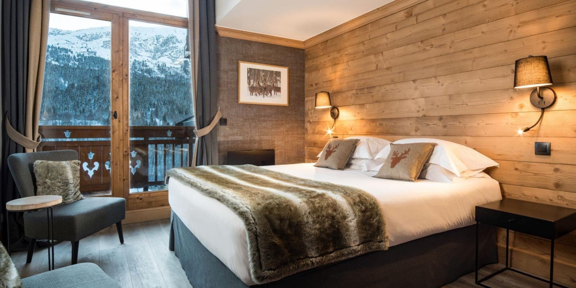 Bedroom with balcony access and mountain views