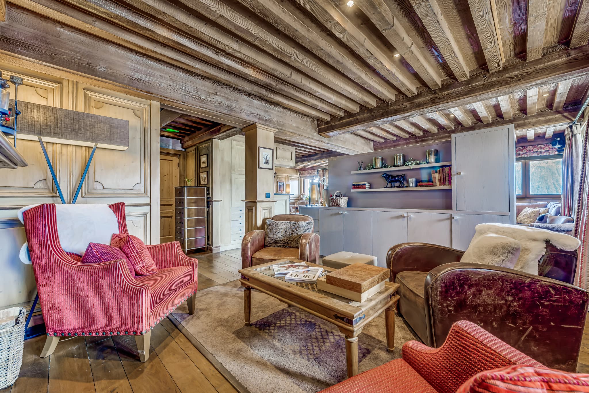 Separate TV snug with armchairs and fireplace