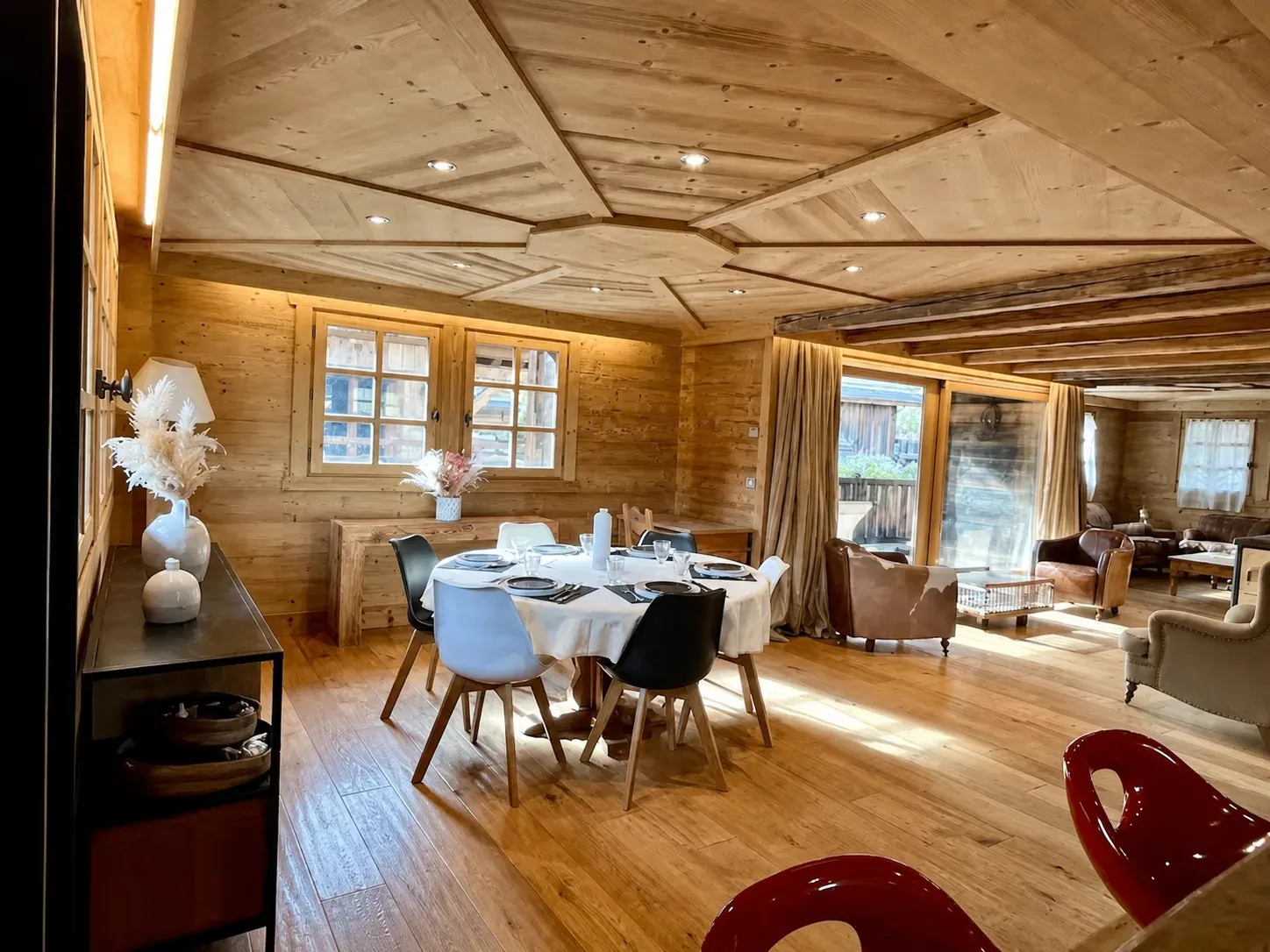 Dining table with windows and timber beams