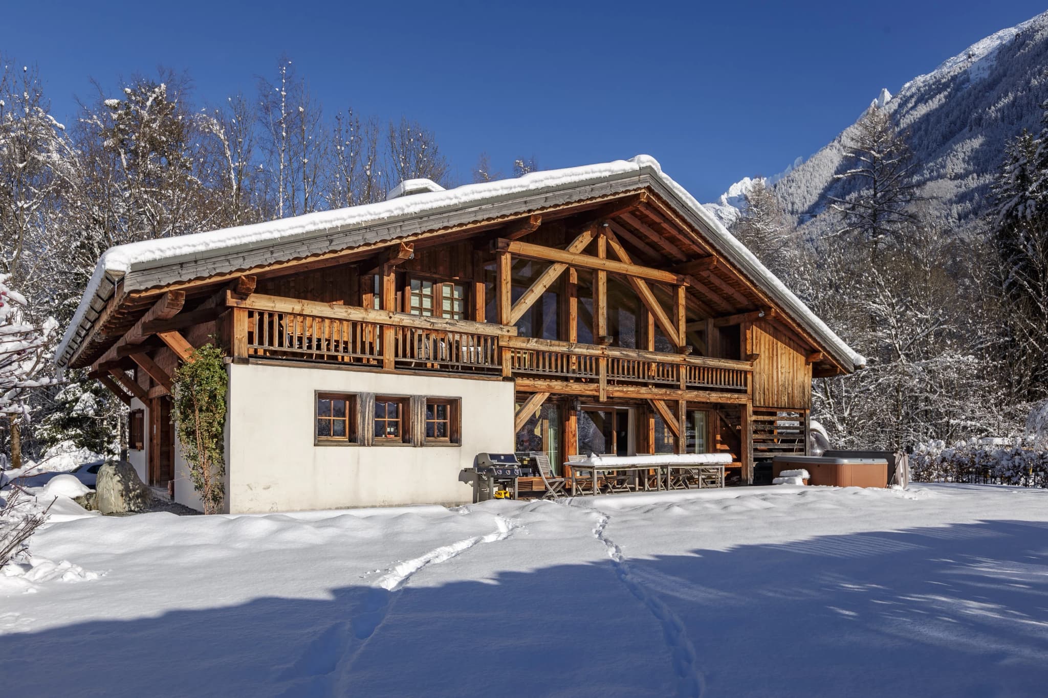 Snow-covered garden beside the chalet