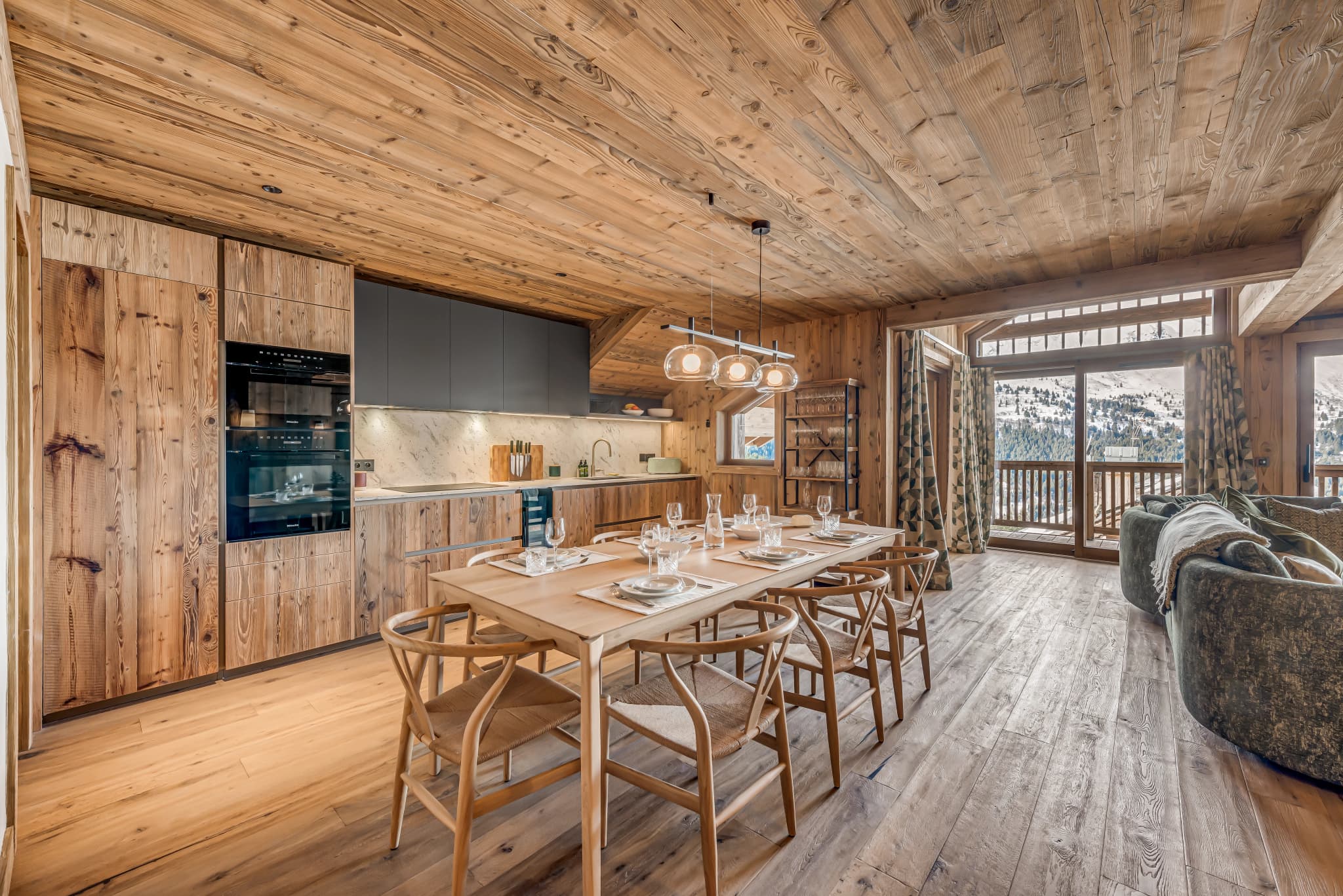 Dining table beside the open kitchen