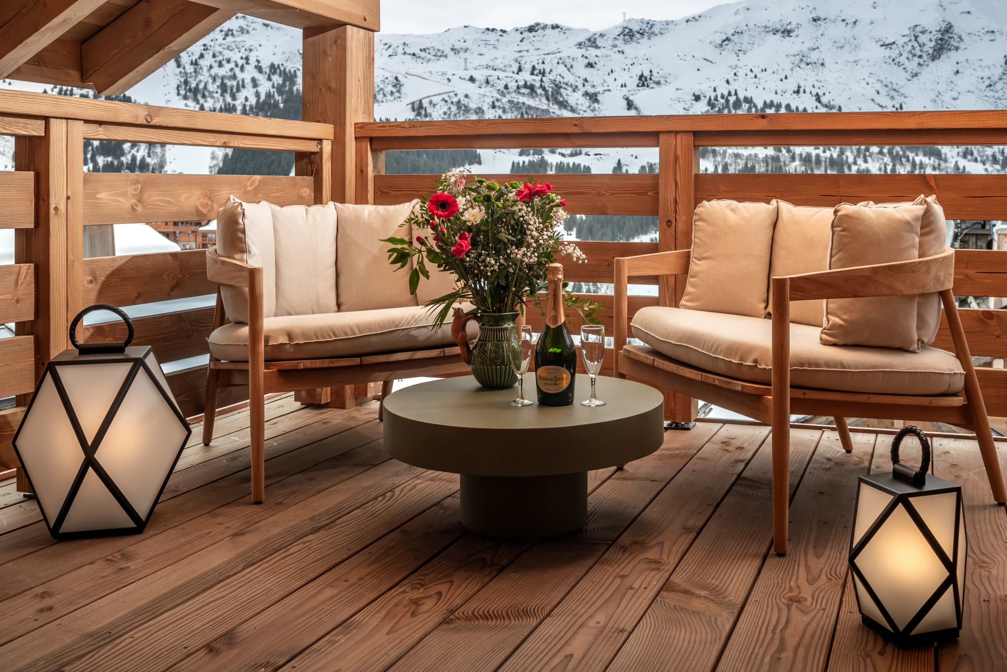 Private terrace seating with mountain views