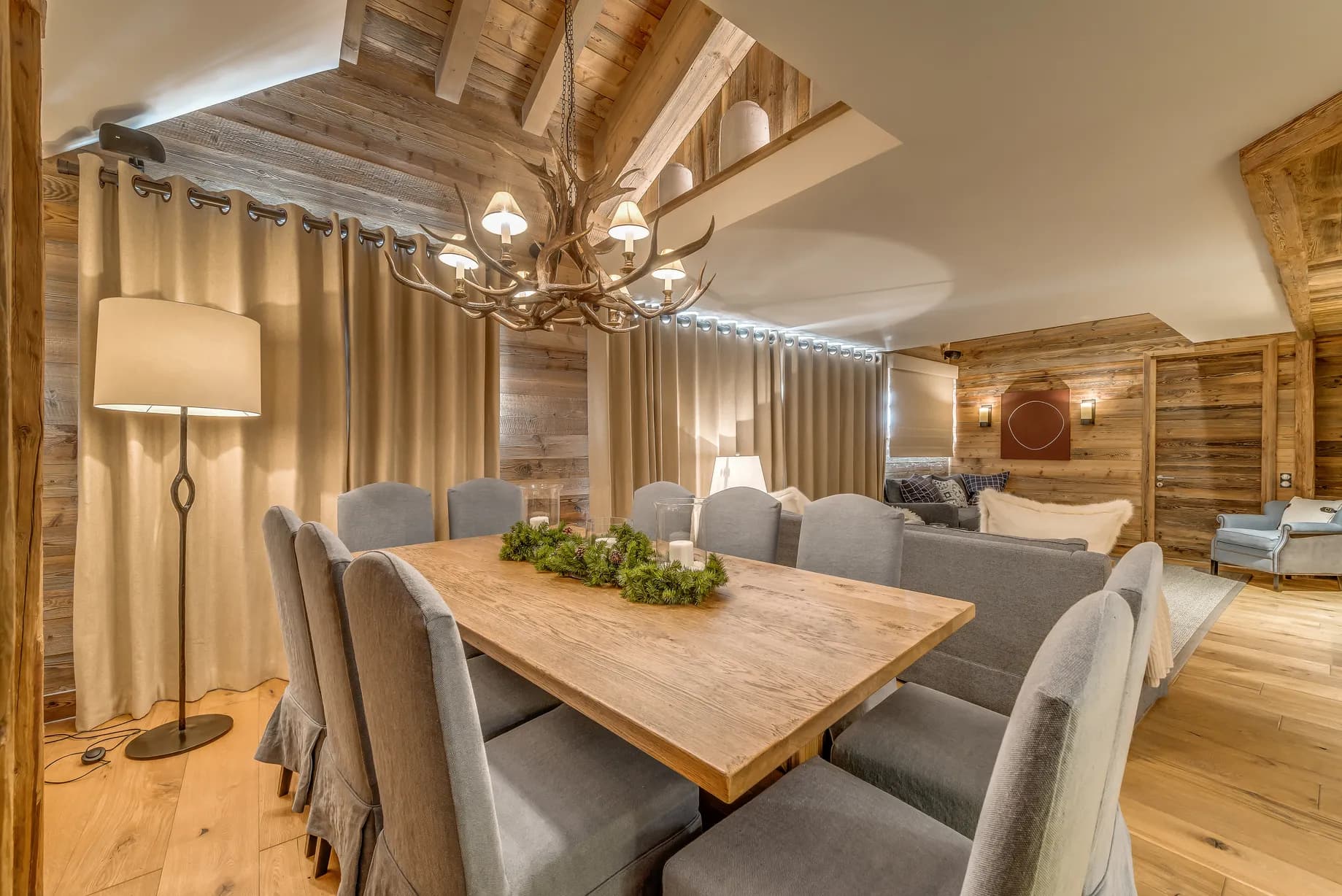 Dining table beneath decorative lighting