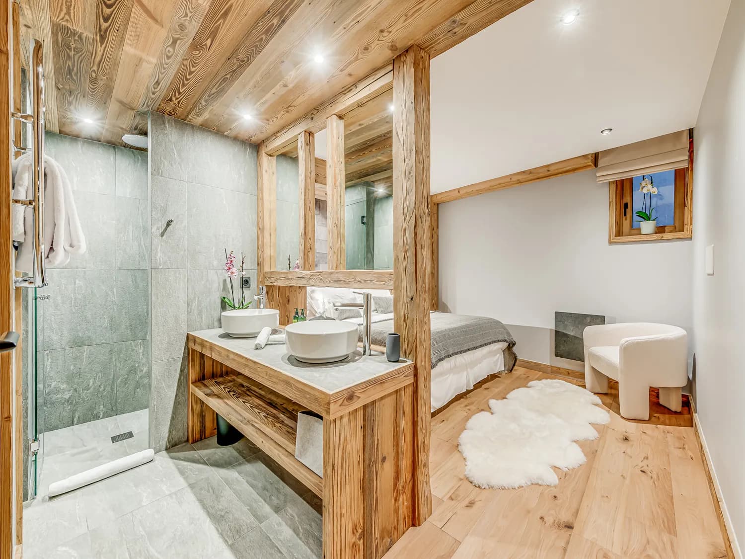 Primary bathroom with bath and shower