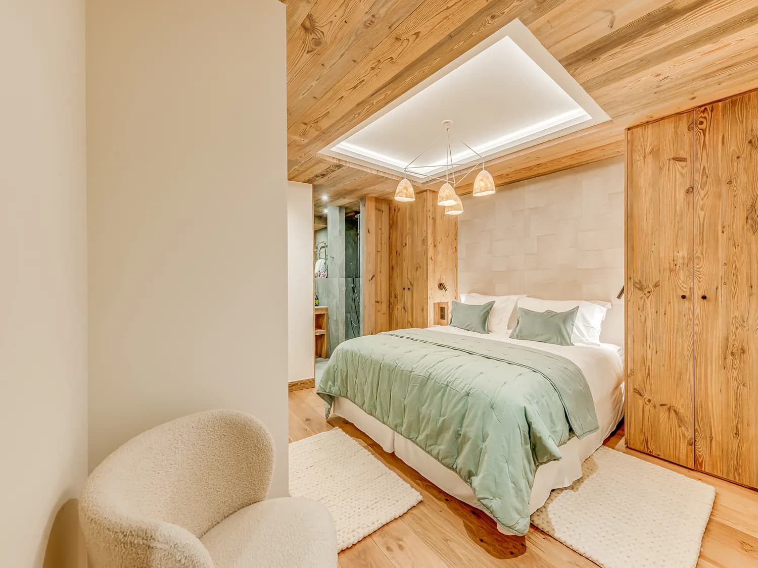Double bedroom with timber walls