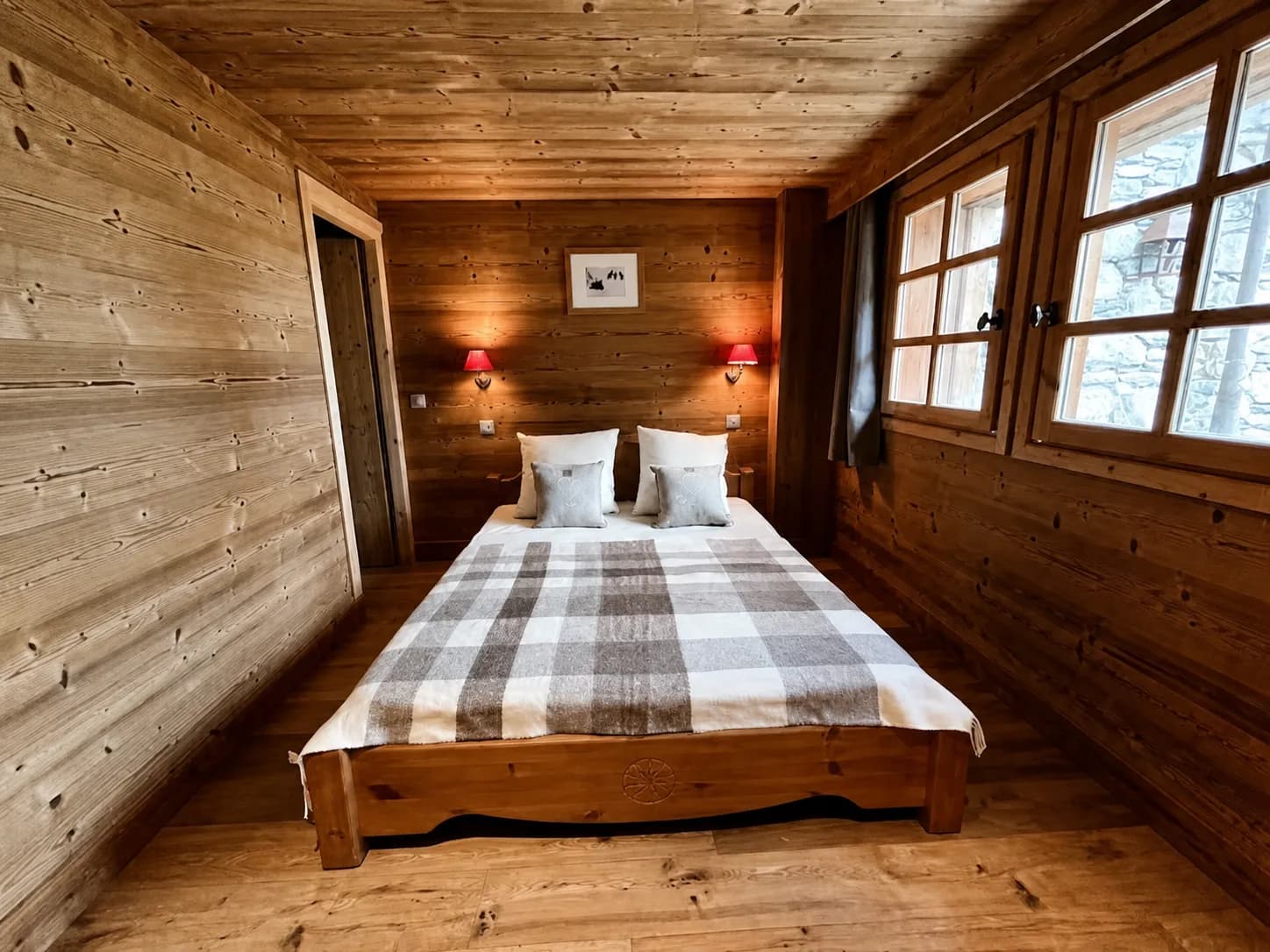 Double bedroom with timber walls