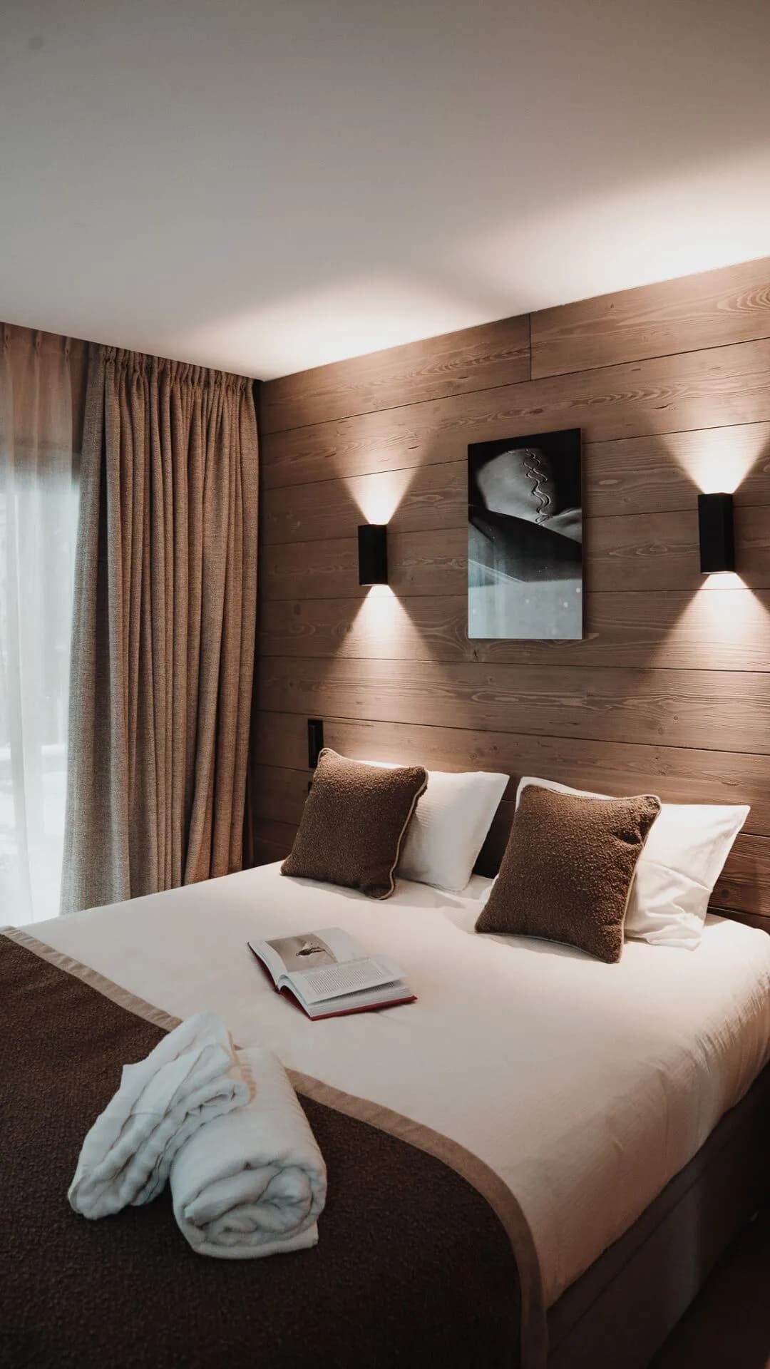 Bedroom with wood panelling