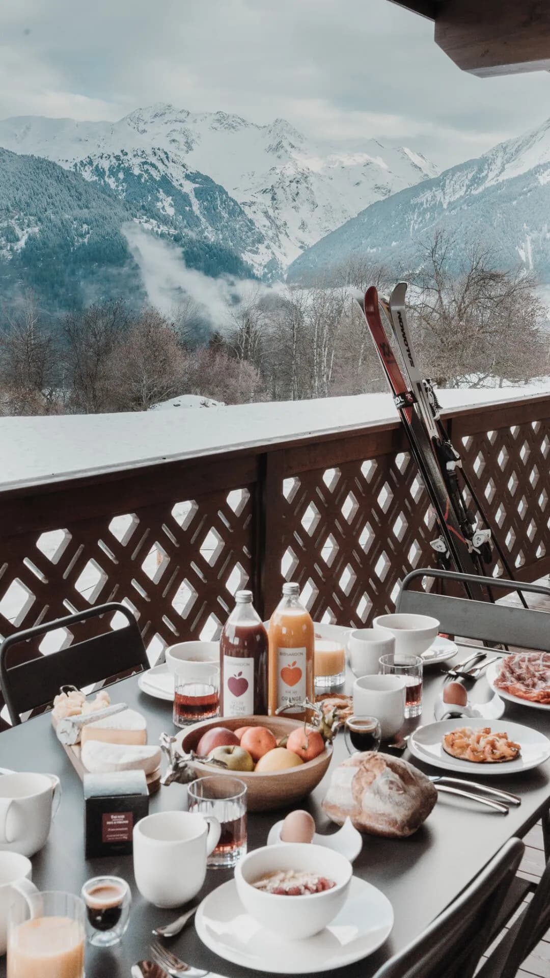 Balcony breakfast table overlooking mountains