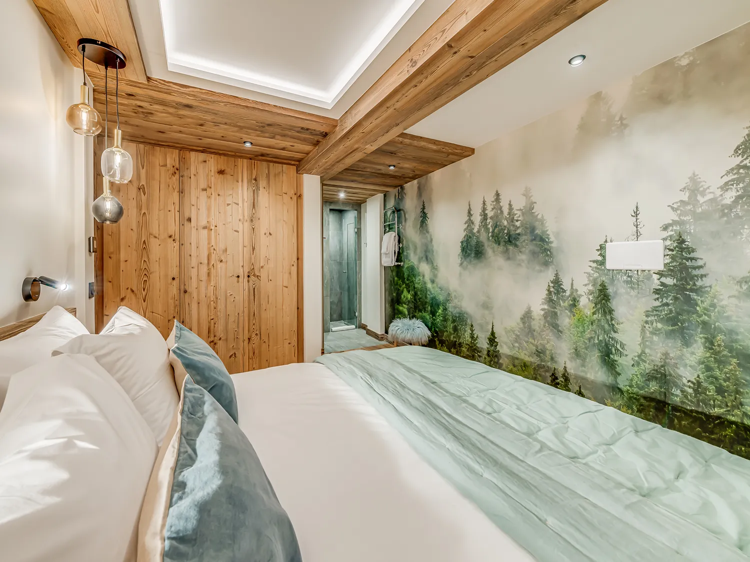 Double bedroom with a forest mural