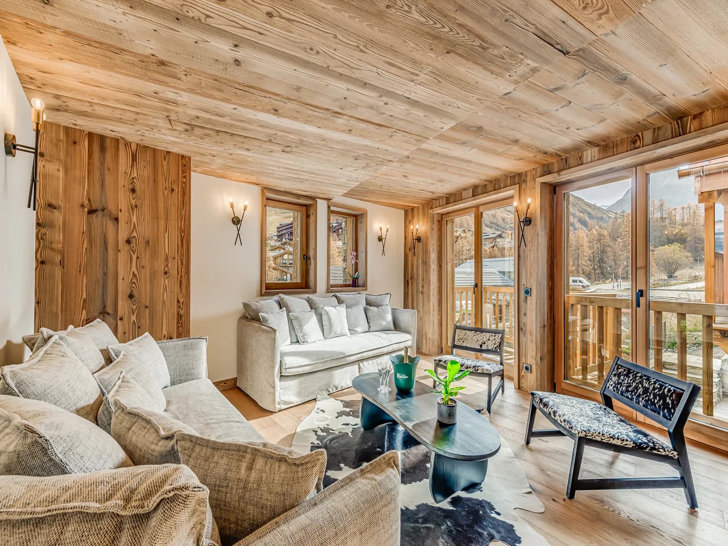 Fireplace lounge opening onto a balcony