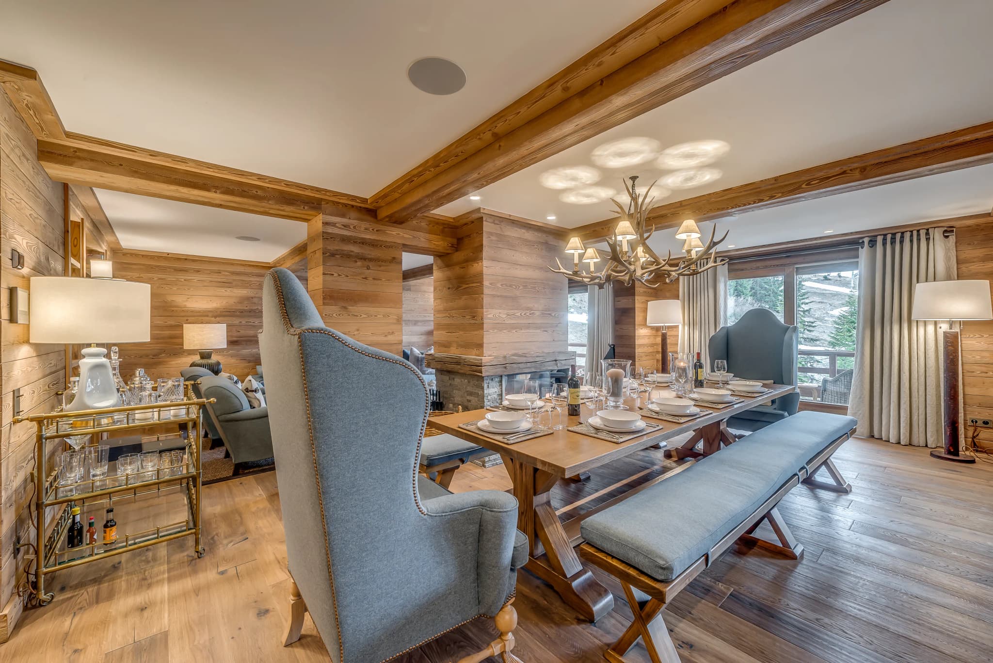 Dining table beside the open-plan kitchen