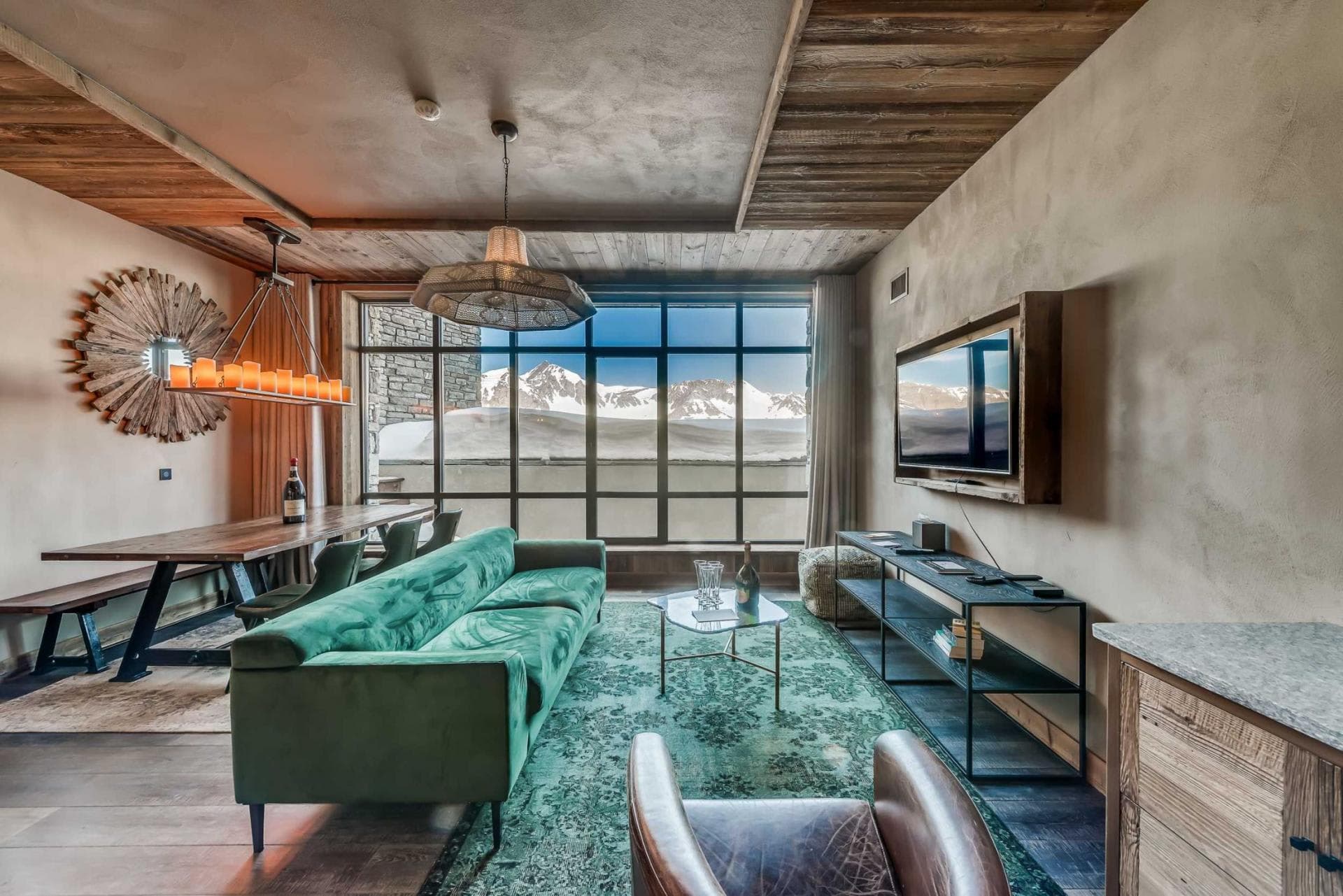 Open living and dining area with panoramic mountain views