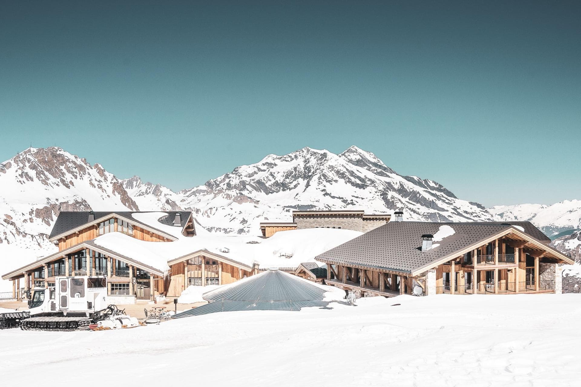 Ski-in, ski-out chalet exterior with panoramic Alpine views