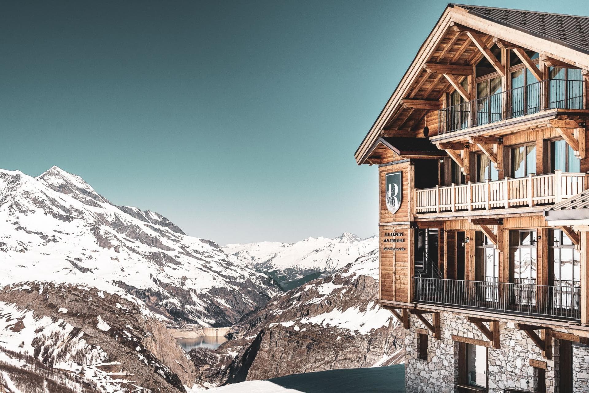 Ski-in/ski-out timber chalet with private balconies overlooking the valley