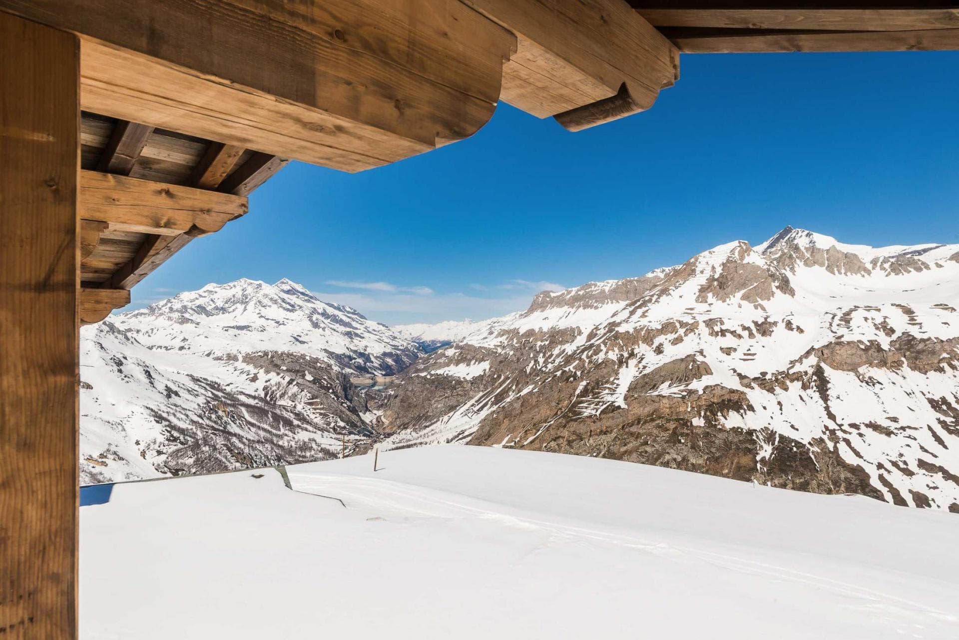 Covered balcony with panoramic views of the French Alps