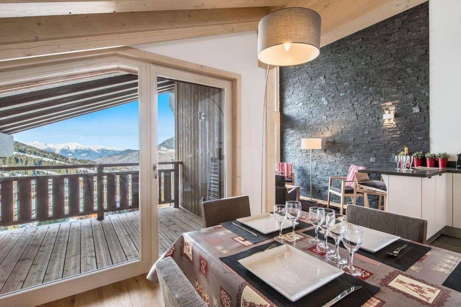 Dining area beside the terrace doors and slate feature wall
