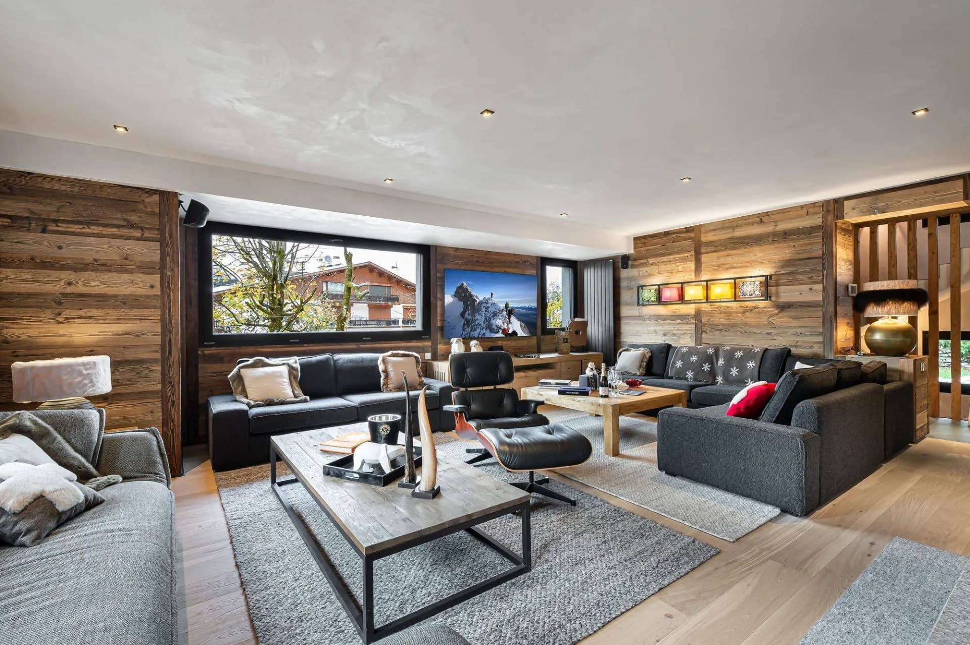 TV lounge with sectional sofa and timber panelling