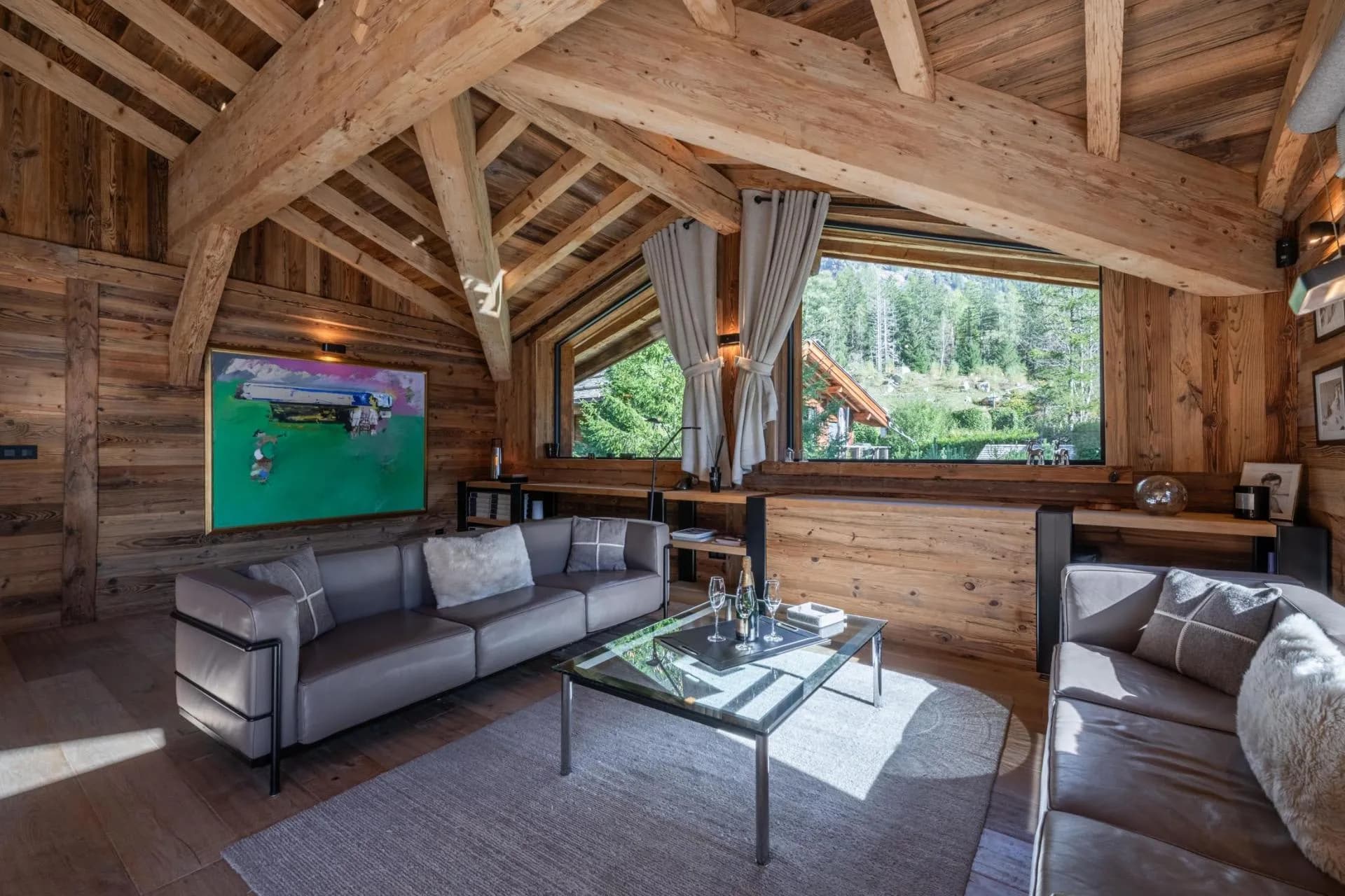 Timber lounge with television seating and broad picture windows