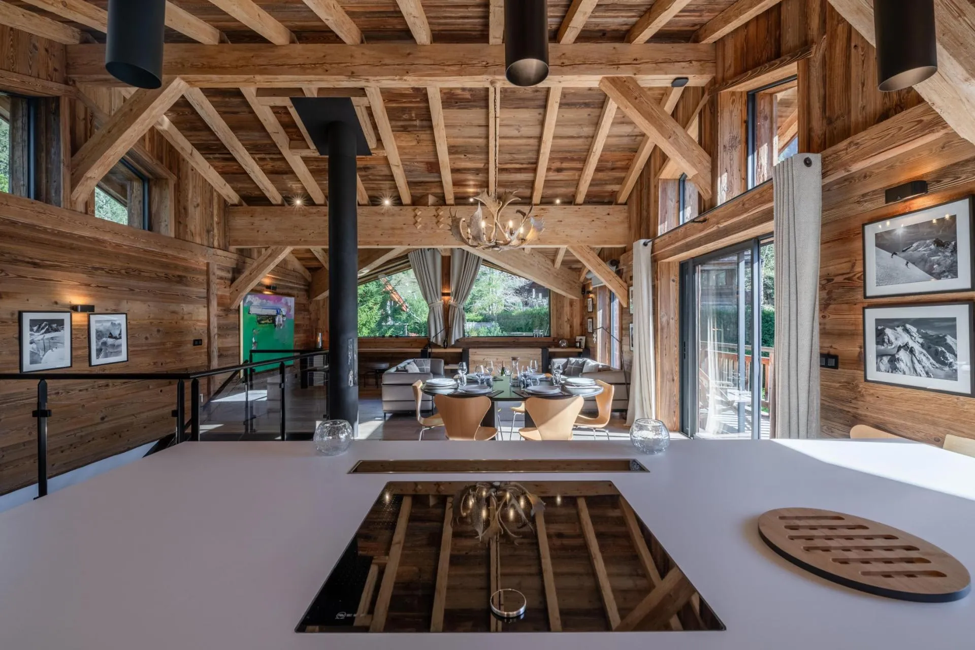 Dining area and lounge viewed across the kitchen island