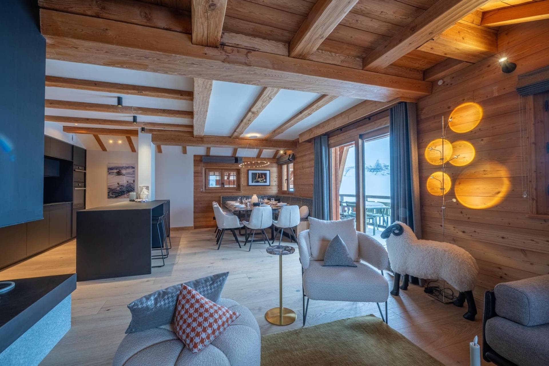 Open-plan lounge with terrace doors and adjoining dining area