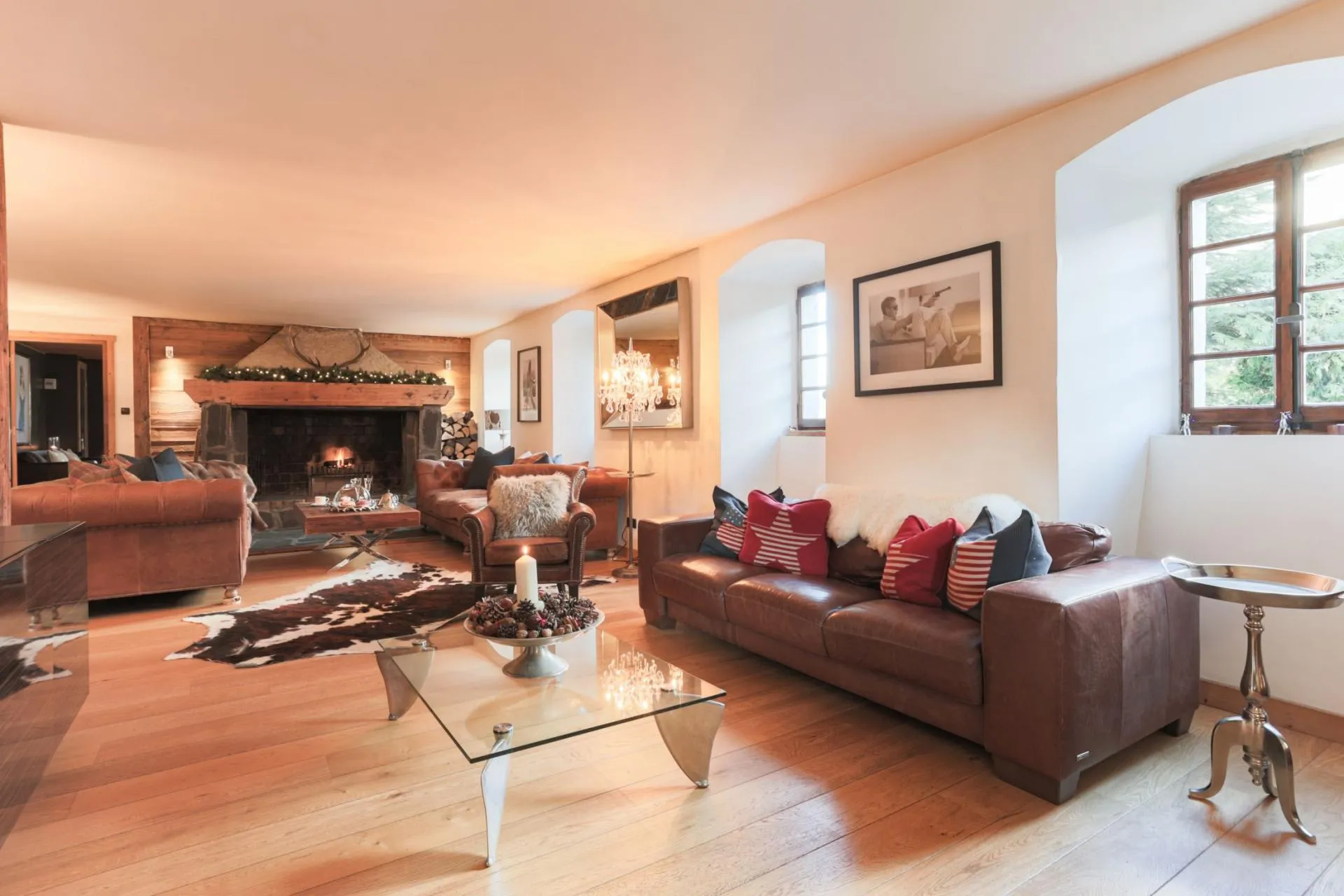 Living area with an open fireplace and leather seating