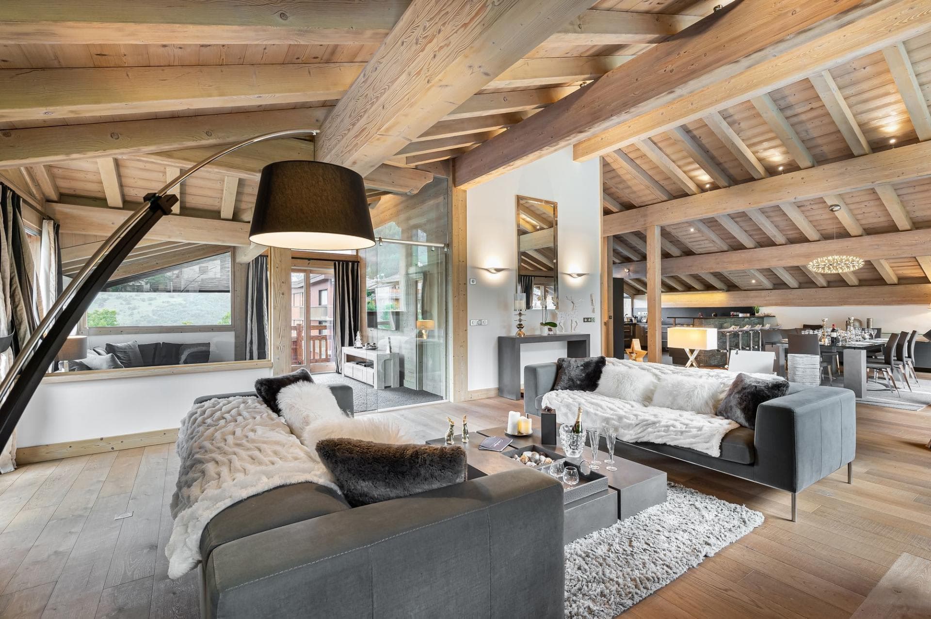 Top-floor lounge beneath exposed timber beams