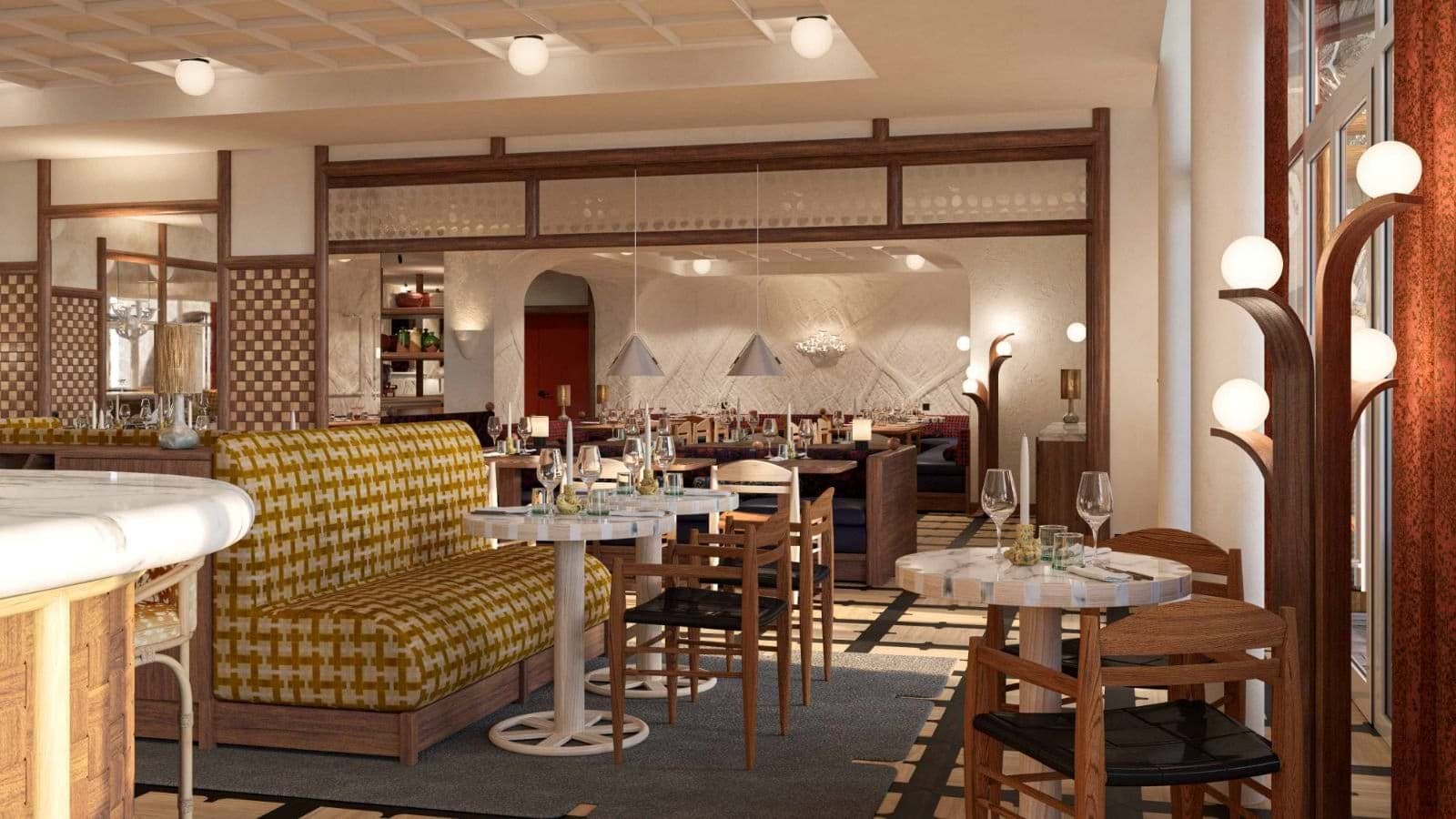 On-site restaurant with booth seating and marble bistro tables