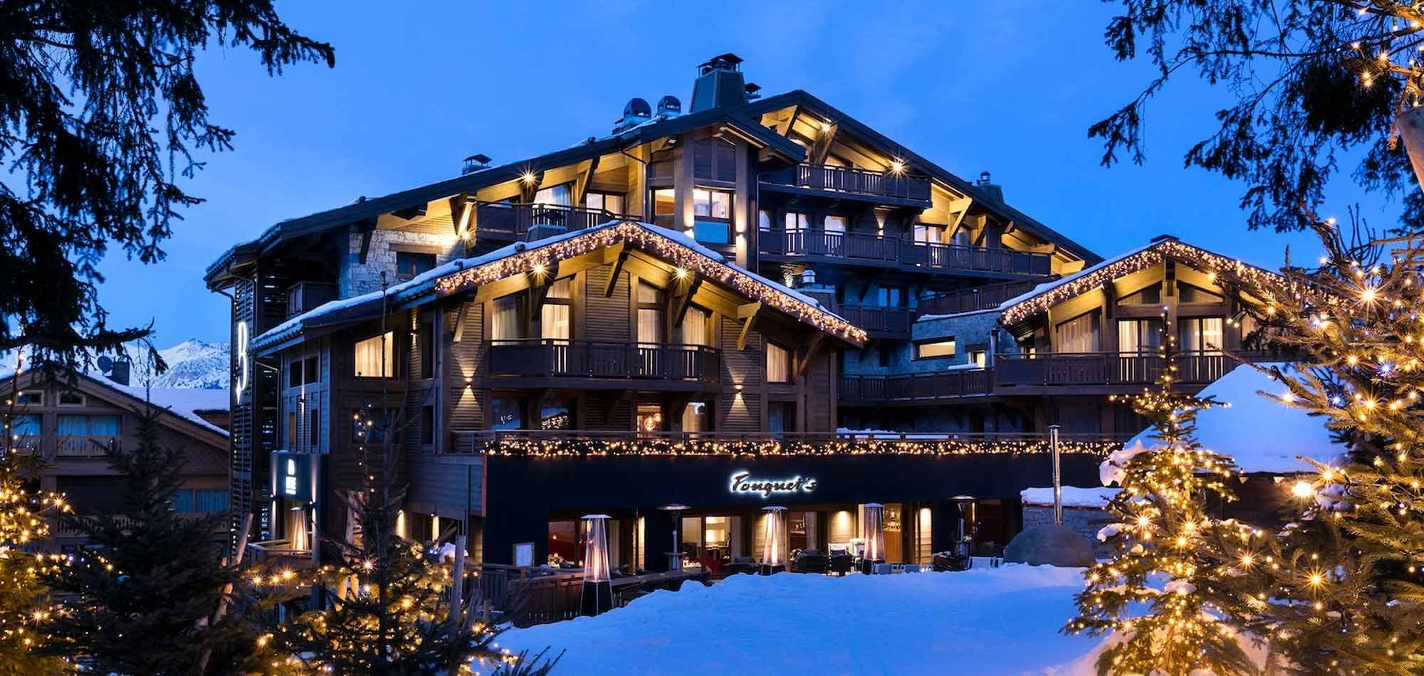 Ski-in/ski-out chalet exterior featuring private balconies and onsite restaurant