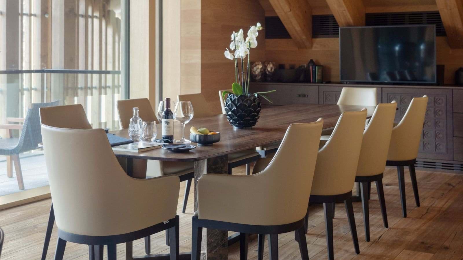 Dining area seats 8 with balcony access and smart TV