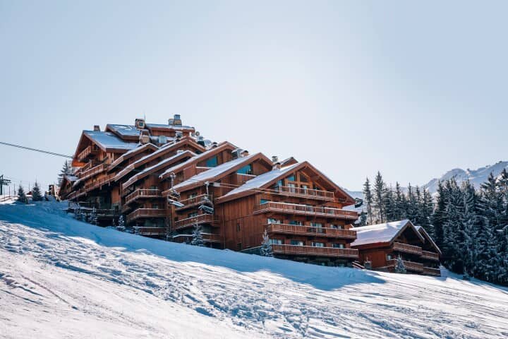 Ski-in, ski-out timber chalets with private balconies and mountain views