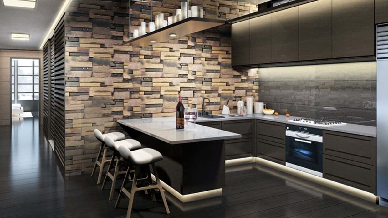 Kitchen with peninsula seating for 3 and gas range cooktop