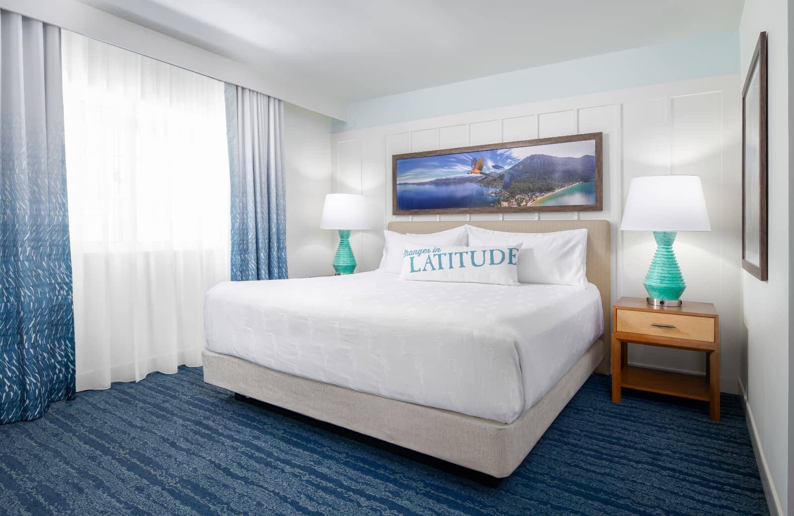 Guest bedroom with king bed and board and batten accent wall