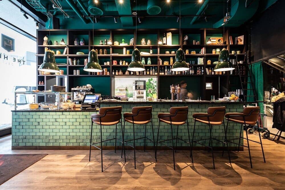 On-site cafe bar with stool seating for five