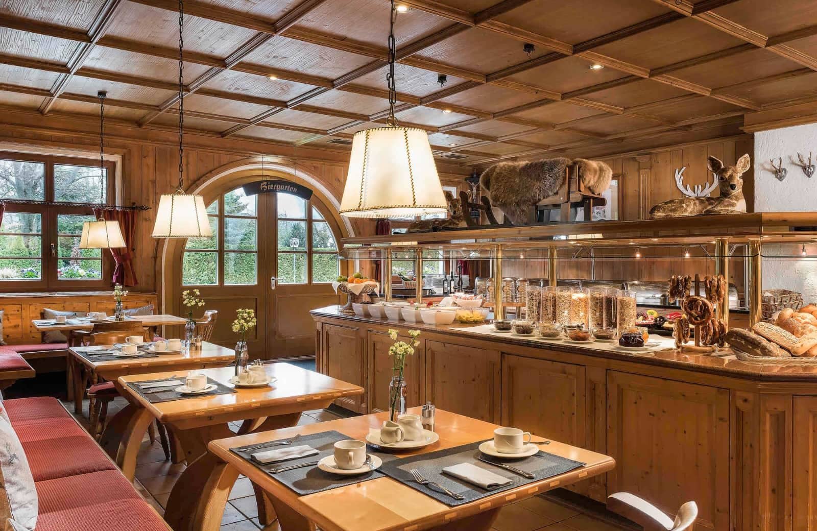 Breakfast area with buffet station and access to outdoor biergarten